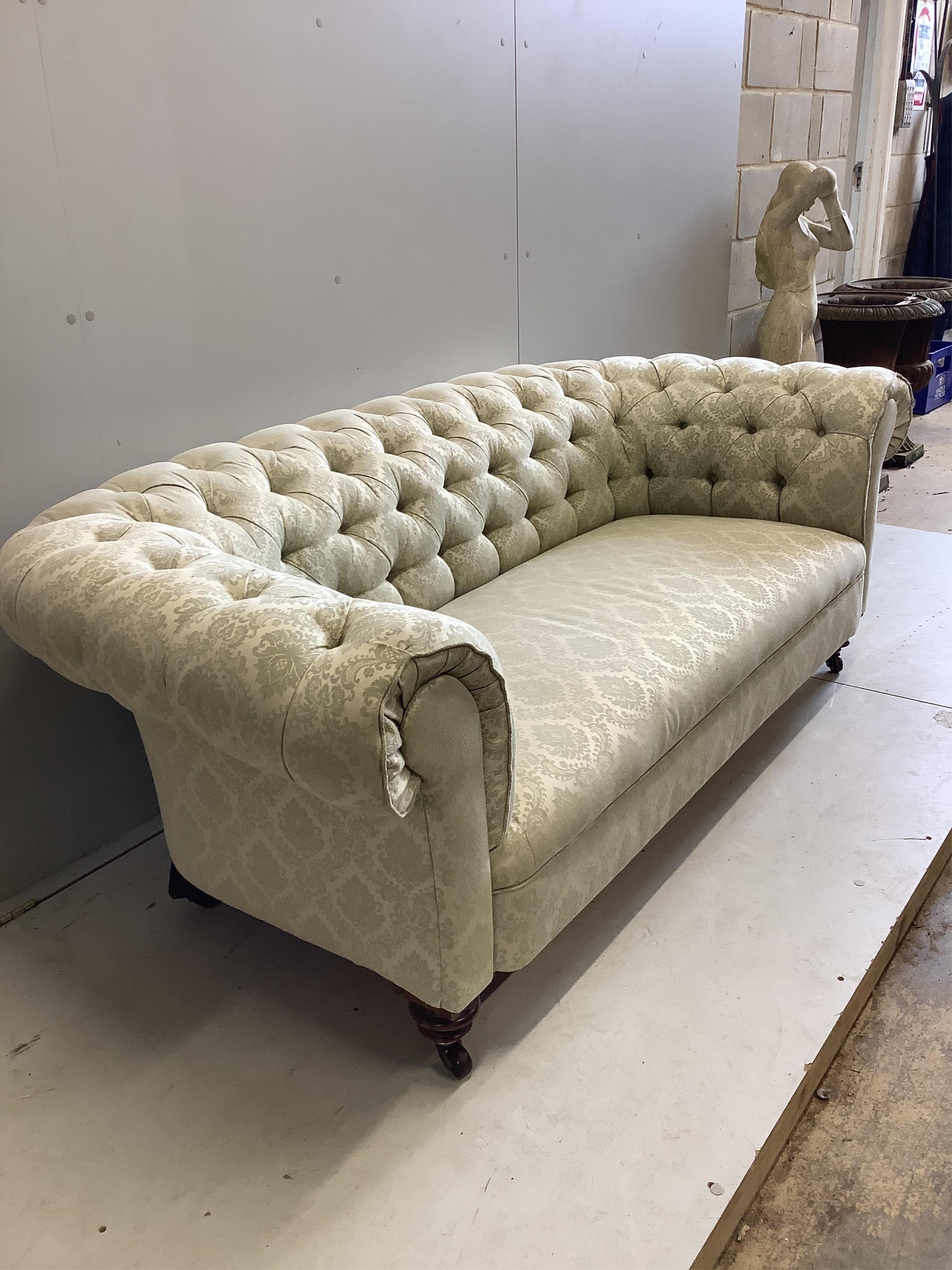 A late Victorian upholstered Chesterfield settee, width 190cm, depth 86cm, height 66cm. Condition - fair